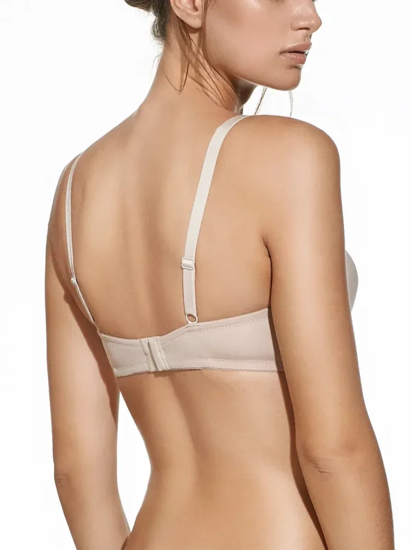 Costas de sutiã cor terra com enchimento e sem aros, alças ajustáveis e fecho, pensado para máximo conforto e suporte diário.