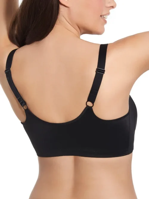 Vista traseira do sutiã preto com costas lisas e alças ajustáveis, sem fecho traseiro, pensado para conforto e fácil vestir com fecho frontal.
