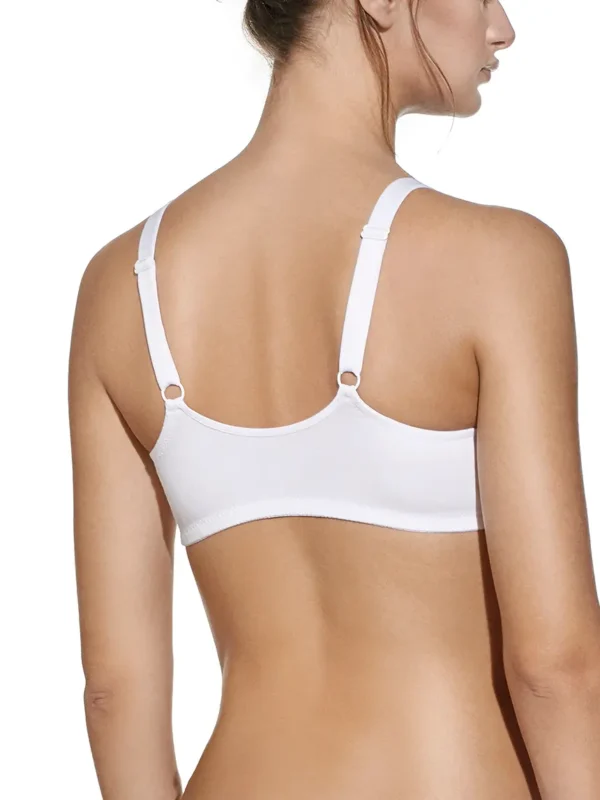 Vista traseira de sutiã branco de algodão, sem aros e sem enchimento, com alças ajustáveis e fecho frontal, pensado para conforto inclusivo diário.